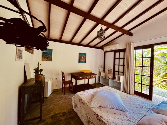 Land with 3 Houses Built